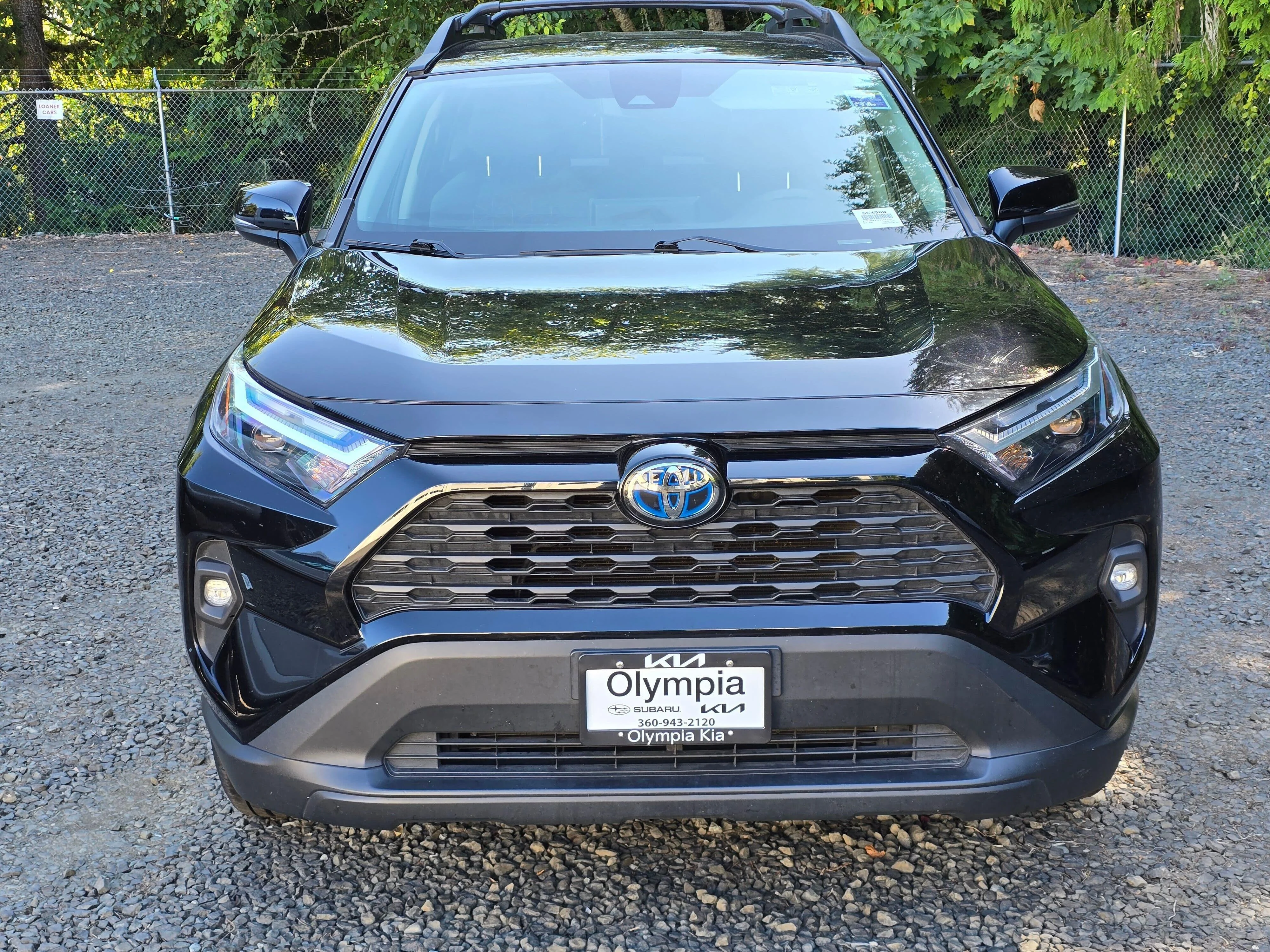Used 2024 Midnight Black Metallic Toyota Woodland Edition image 2