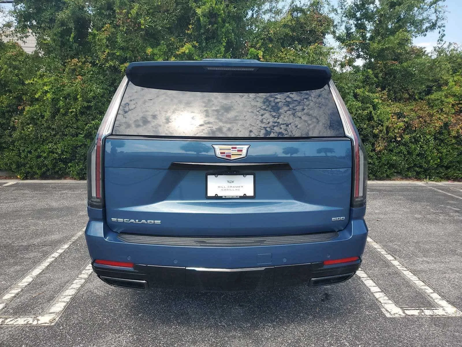 Used 2025 Deep Sea Metallic Cadillac Sport image 4