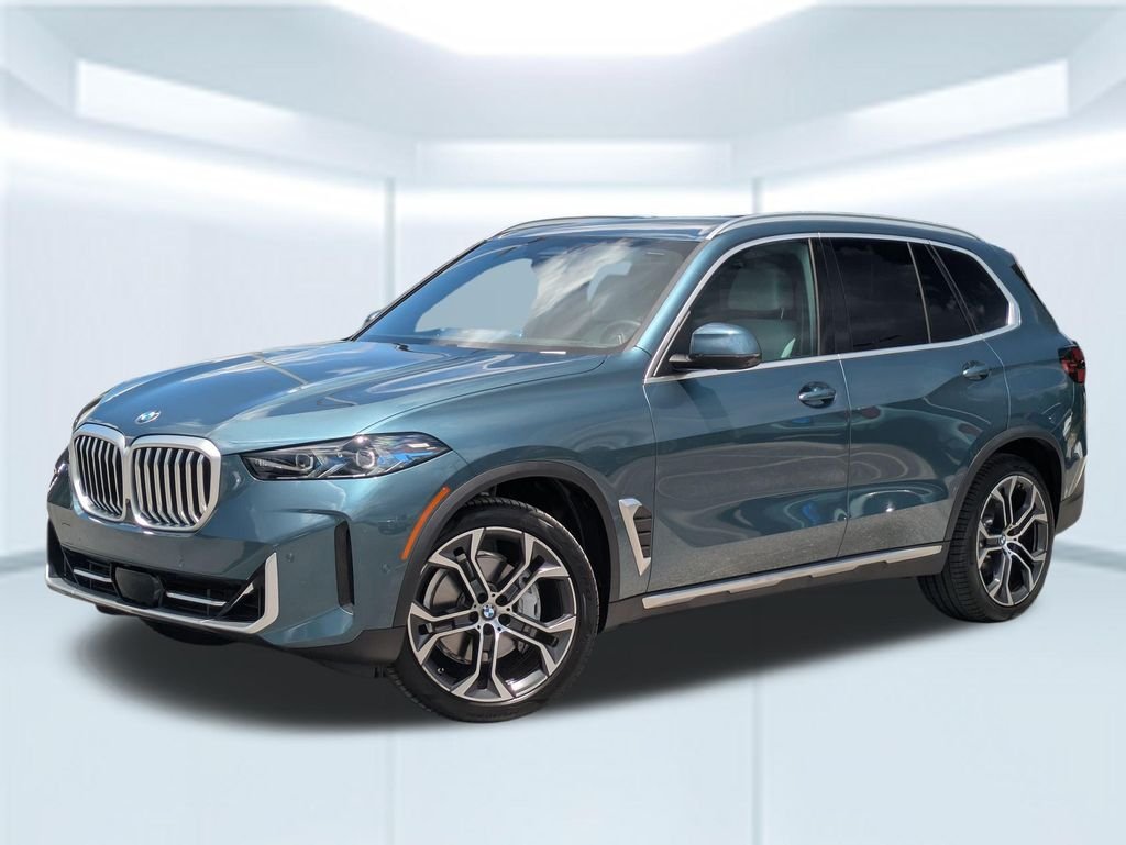 Used 2025 Blue BMW sDrive40i image 1