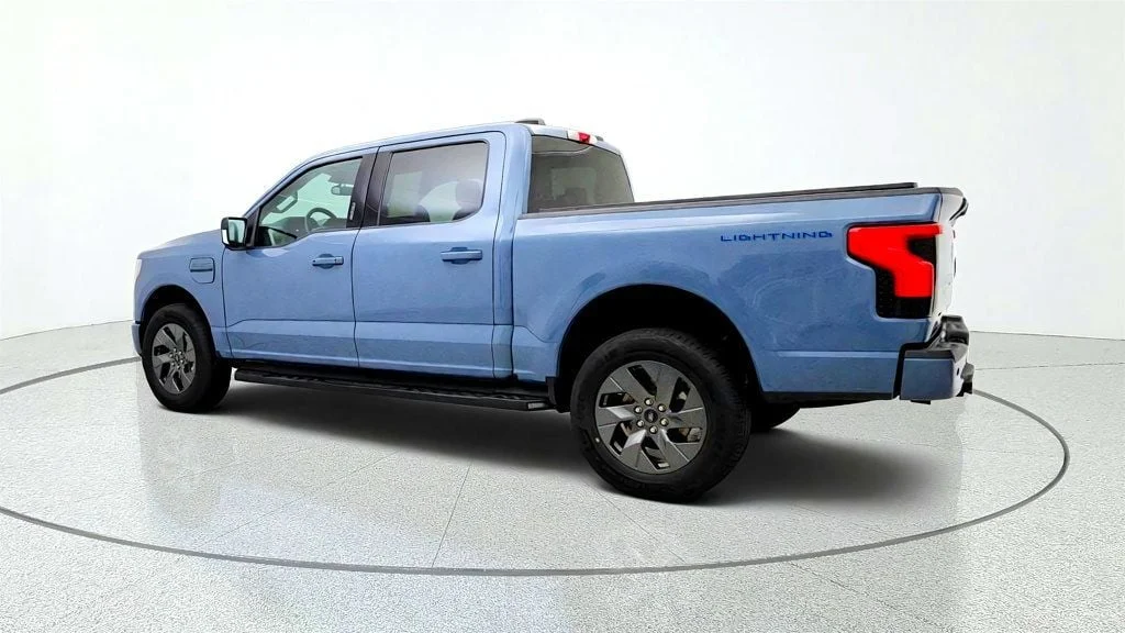Used 2023 Azure Gray Metallic Tri-Coat Ford XLT 4WD SuperCrew 5.5