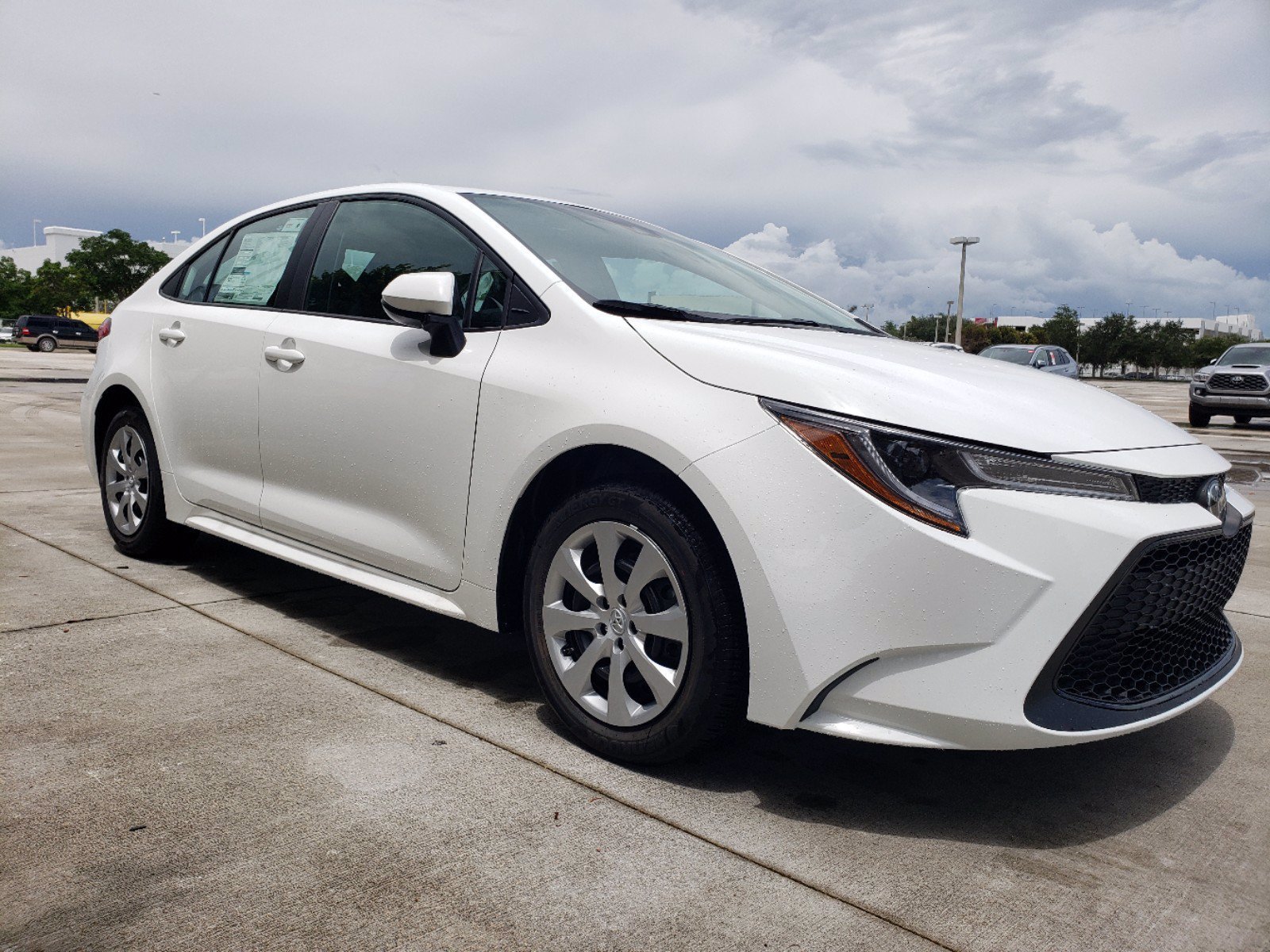 Used 2022 White Toyota LE image 2