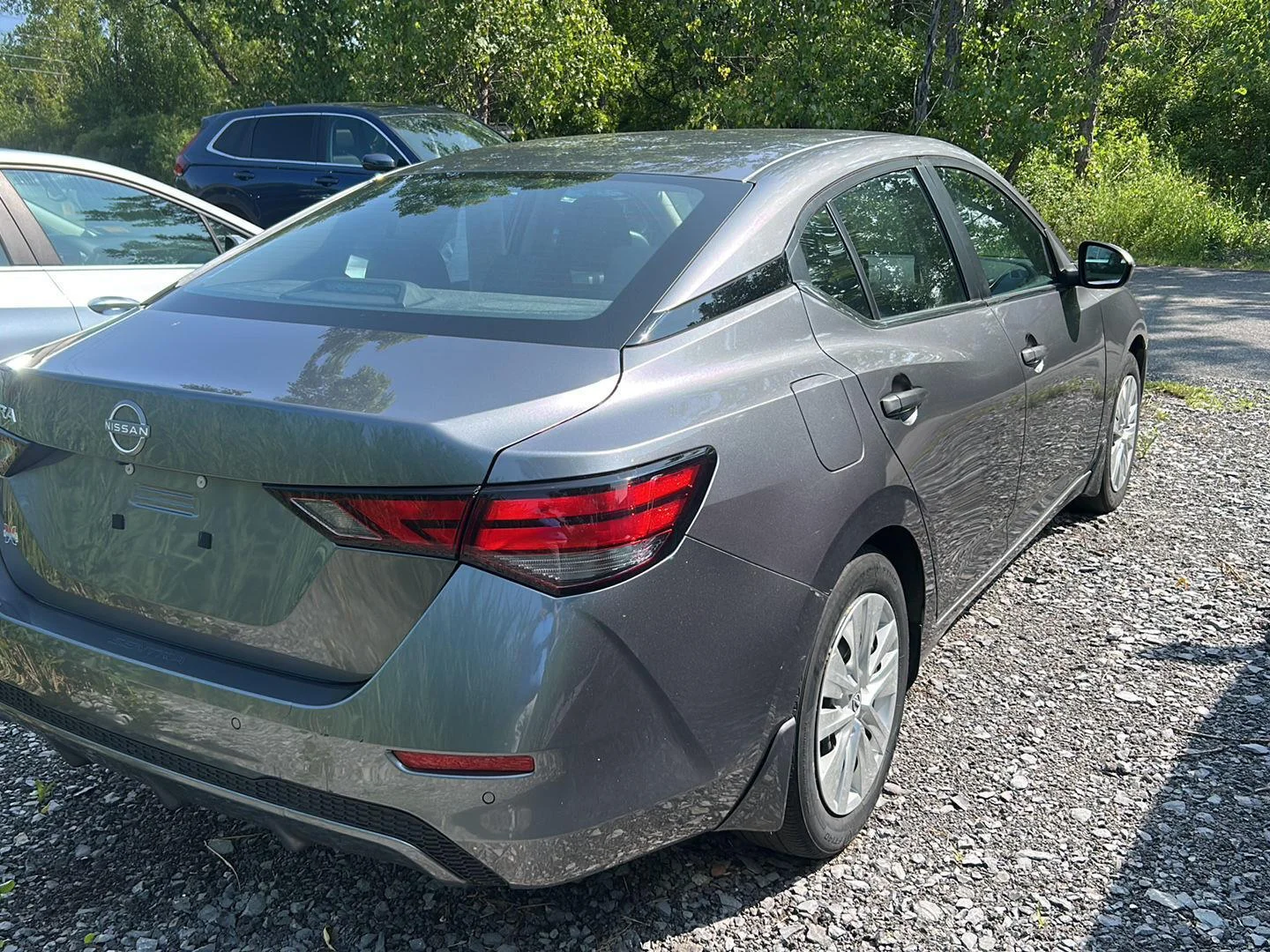 Used 2024 Gun Metallic Nissan S image 3
