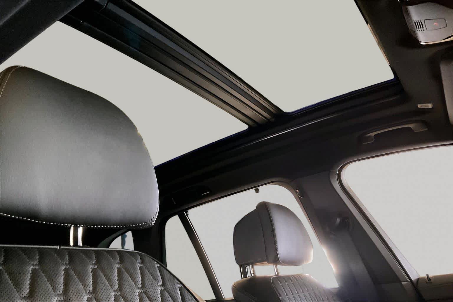 Used 2025 Skyscraper Grey Metallic BMW xDrive50e image 13