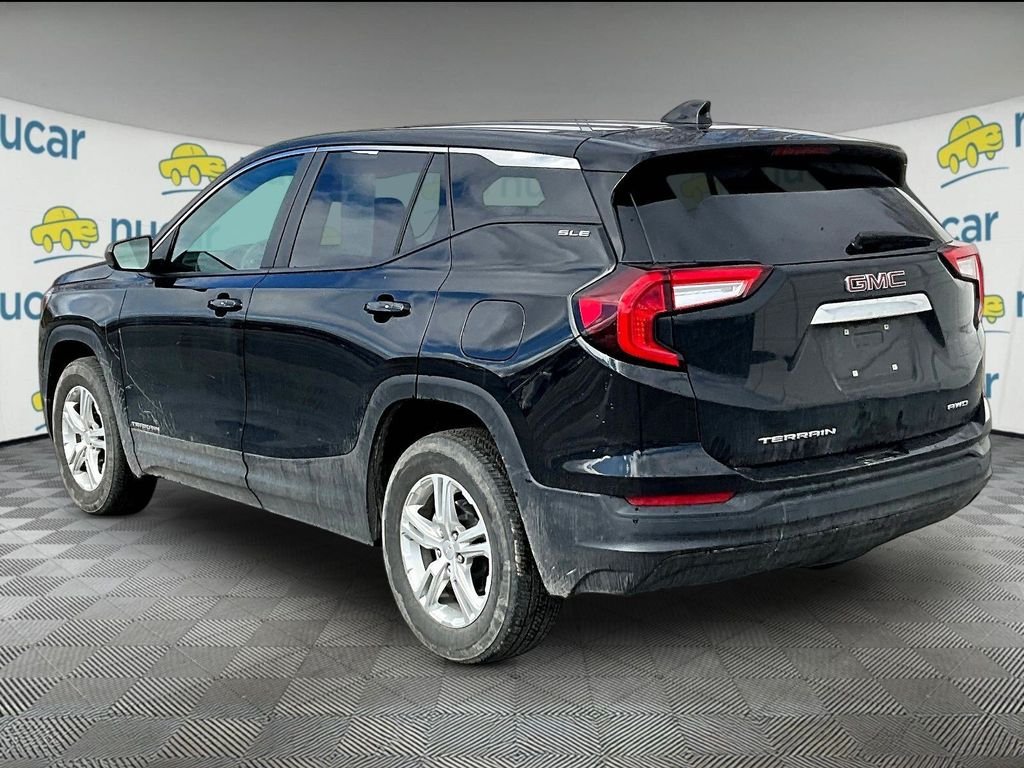 Used 2024 Ebony Twilight Metallic GMC SLE image 4
