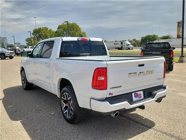 Used 2025 Bright White Clearcoat RAM Laramie 4x4 Crew Cab 144.5 in. WB image 2