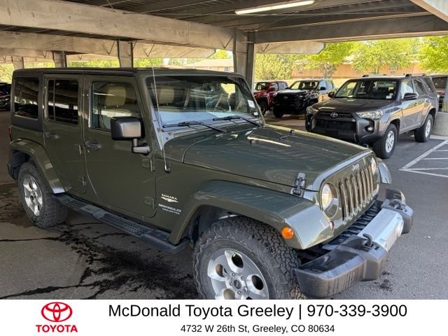 Used 2015 Green Jeep Unlimited Sahara image 3