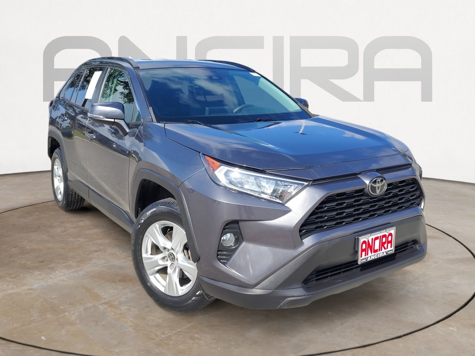 Used 2021 Magnetic Gray Metallic Toyota XLE image 6