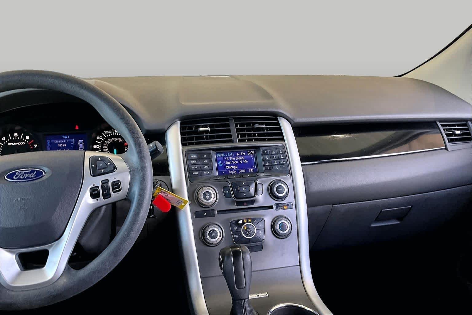 Used 2013 White Suede Ford SE image 6