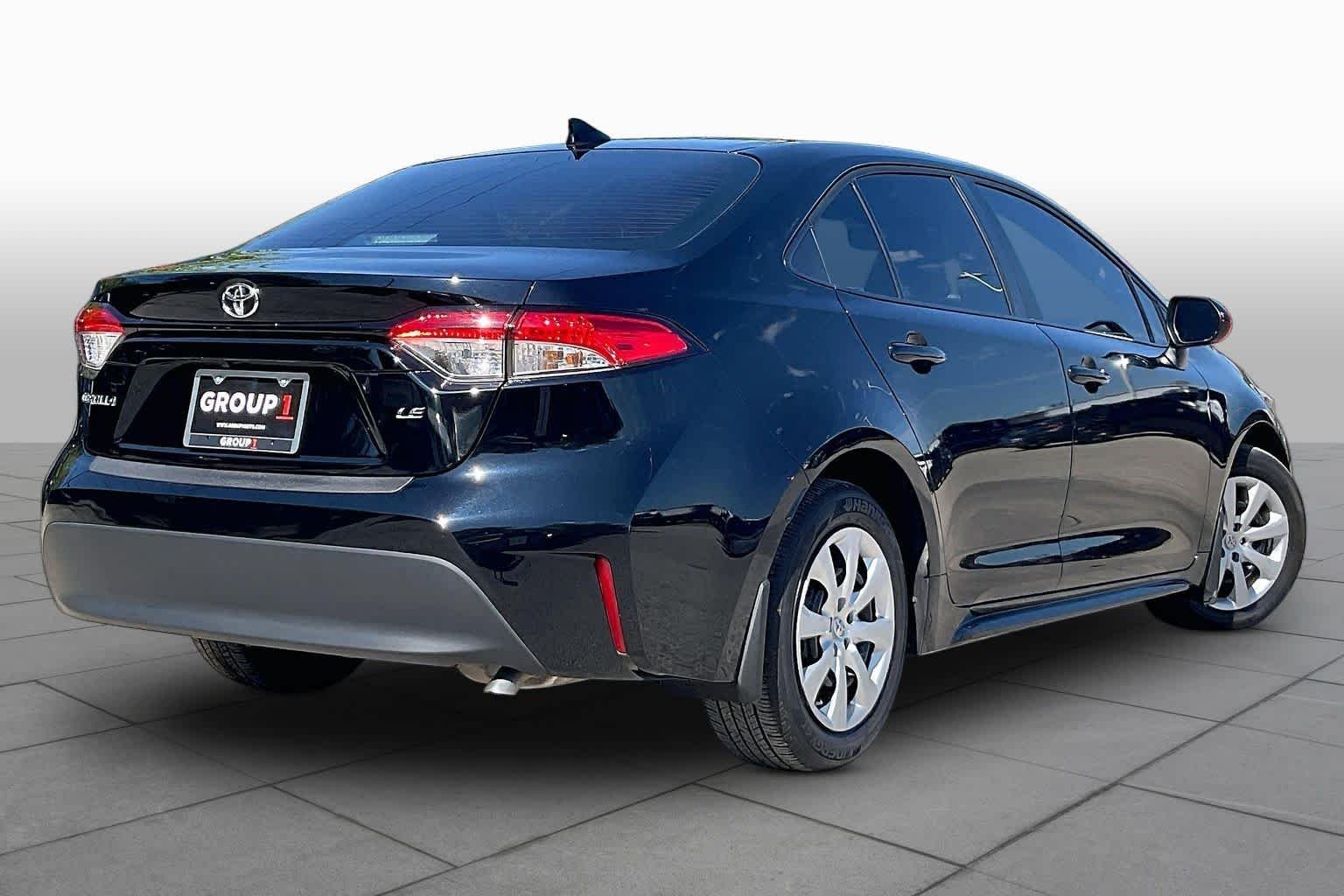 Used 2025 Midnight Black Metallic Toyota LE image 11