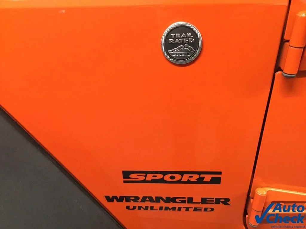 Used 2015 Orange Jeep Unlimited Sport image 20