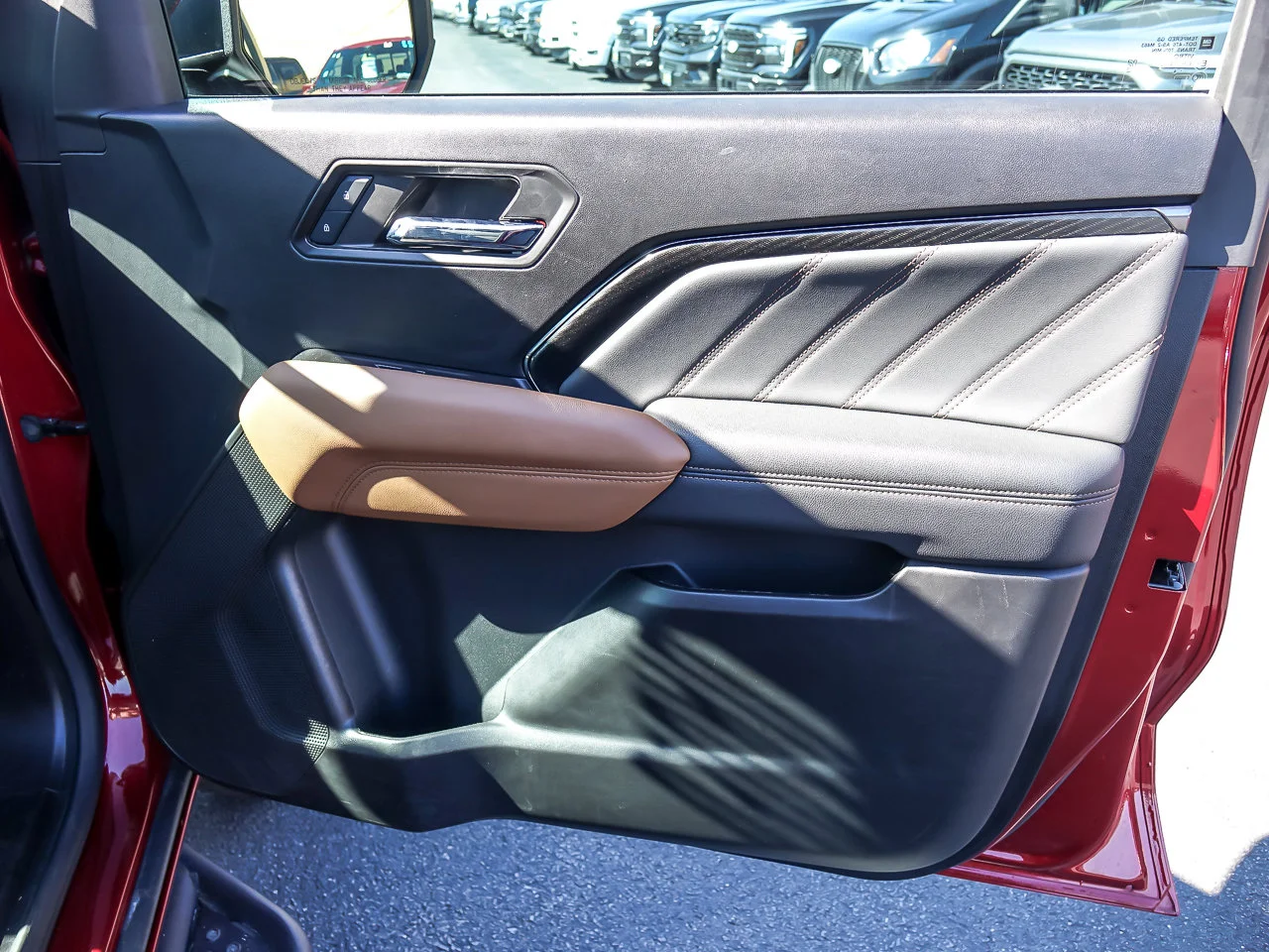 Used 2024 Volcanic Red Tintcoat GMC 4WD AT4 image 28