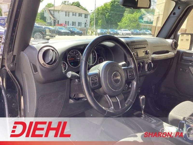 Used 2017 Black Clearcoat Jeep Unlimited Sport image 10