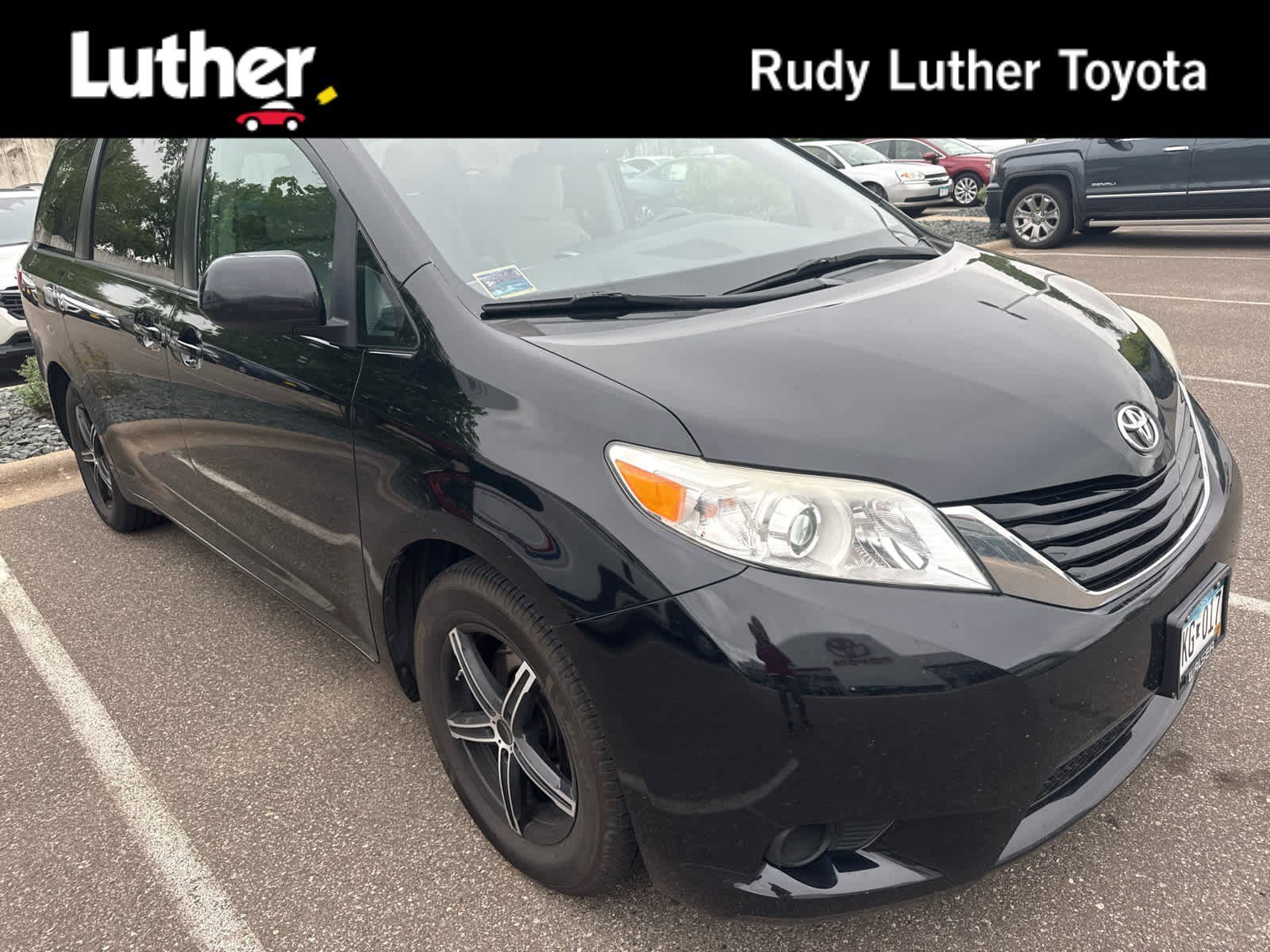Used 2016 Midnight Black Metallic Toyota LE image 1