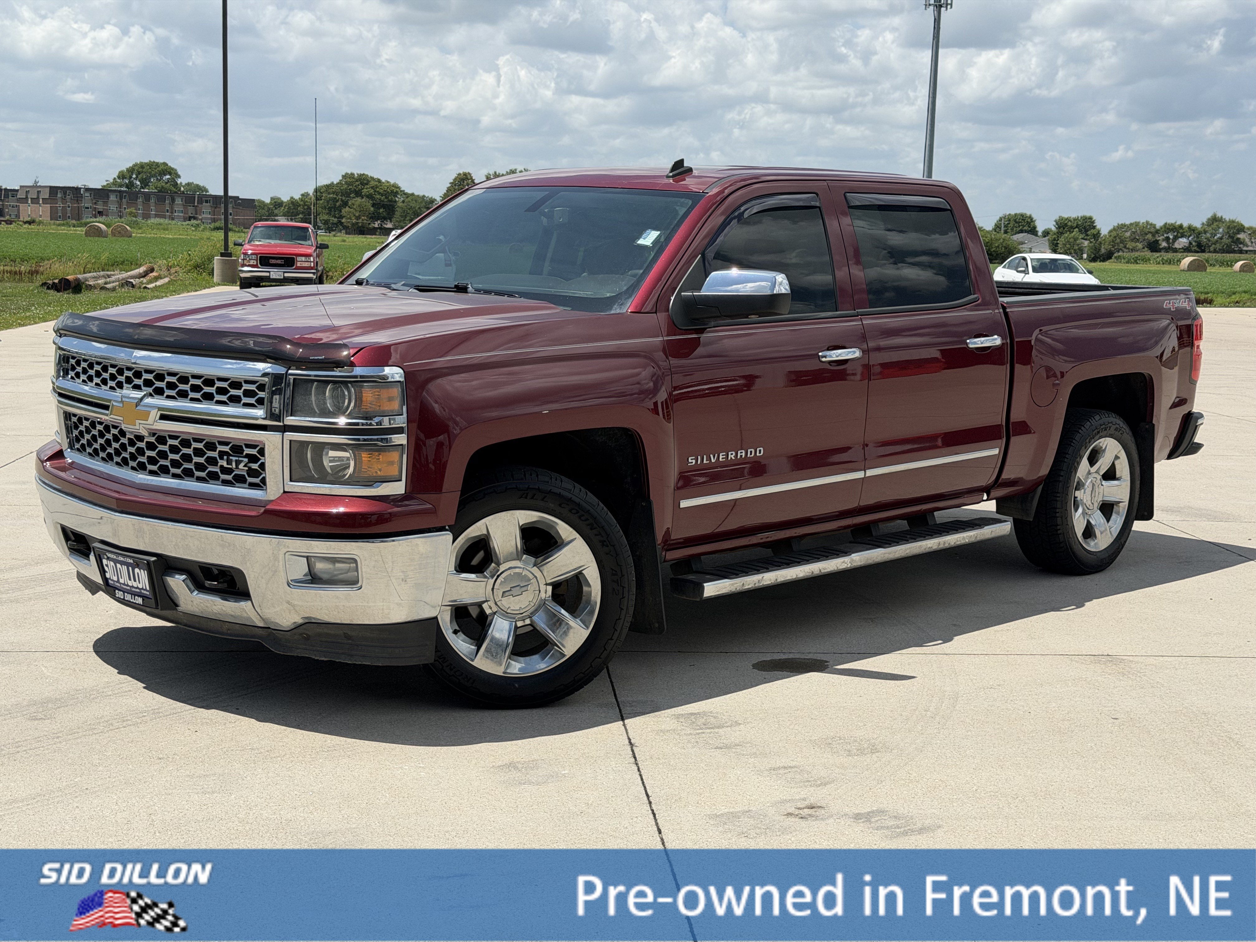 Used 2014 Deep Ruby Metallic Chevrolet LTZ image 1
