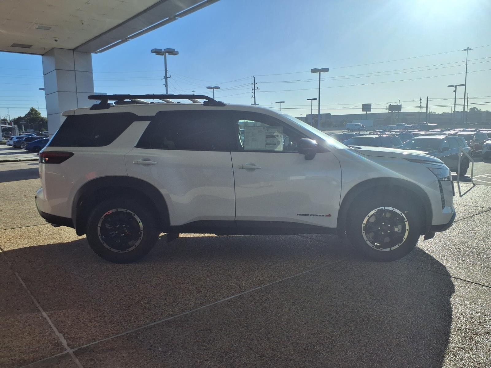 2026 Nissan Pathfinder Rock Creek® White at Robbins Nissan