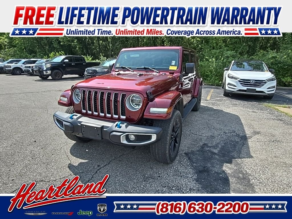 Used 2022 Red Jeep Unlimited Sahara 4xe image 1