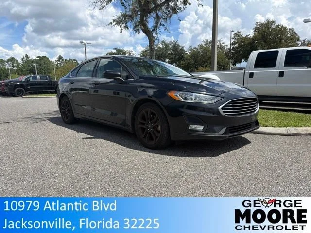 Used 2019 Black Ford SE image 1