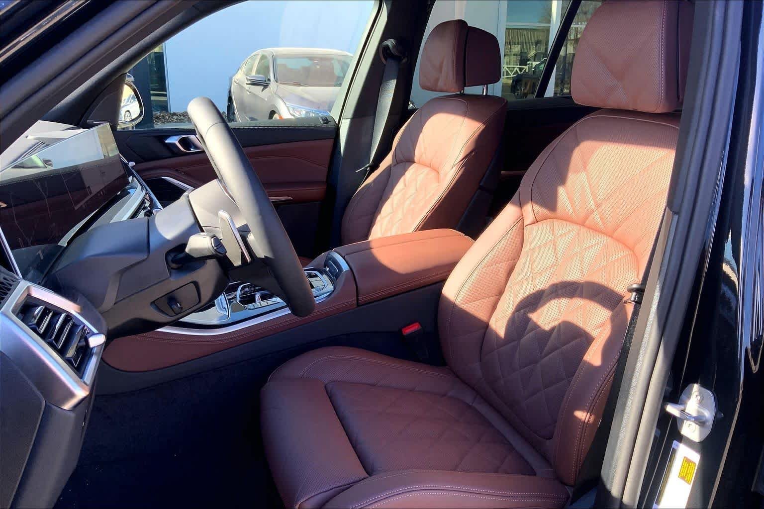 New 2026 Black Sapphire Metallic BMW xDrive50e image 9
