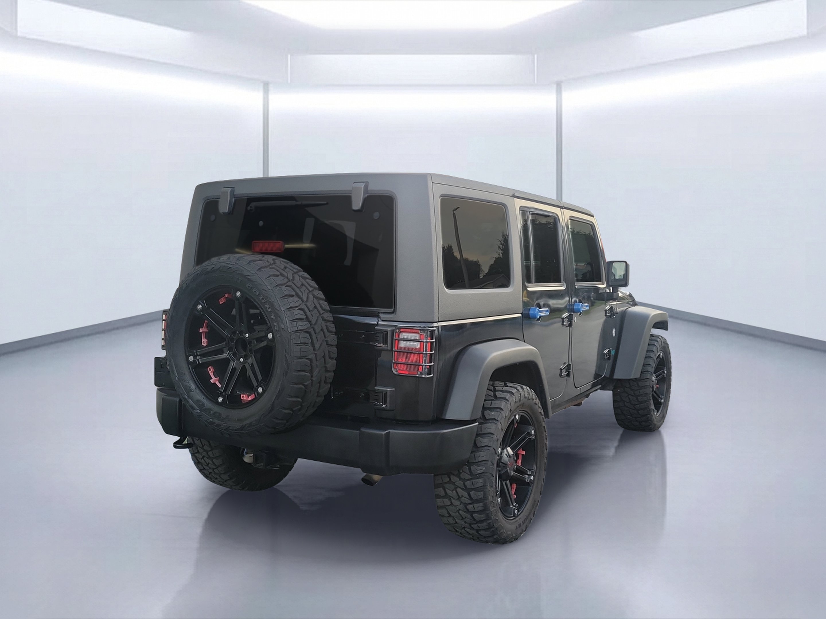 Used 2011 Black ClearCoat Jeep Unlimited Sport image 4
