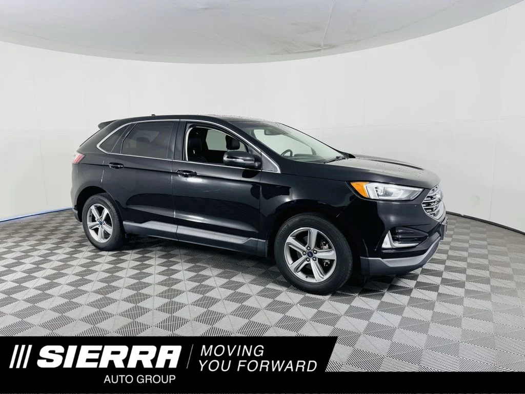 Used 2019 Black Ford SEL image 1