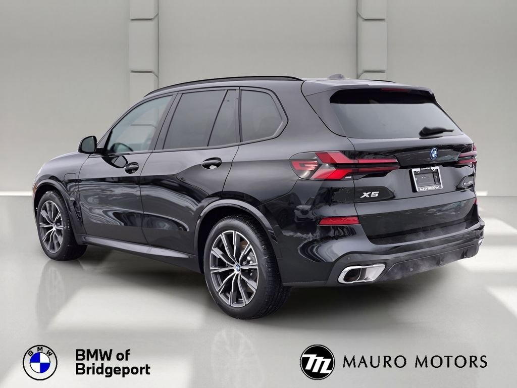 Used 2026 Black BMW xDrive50e image 5