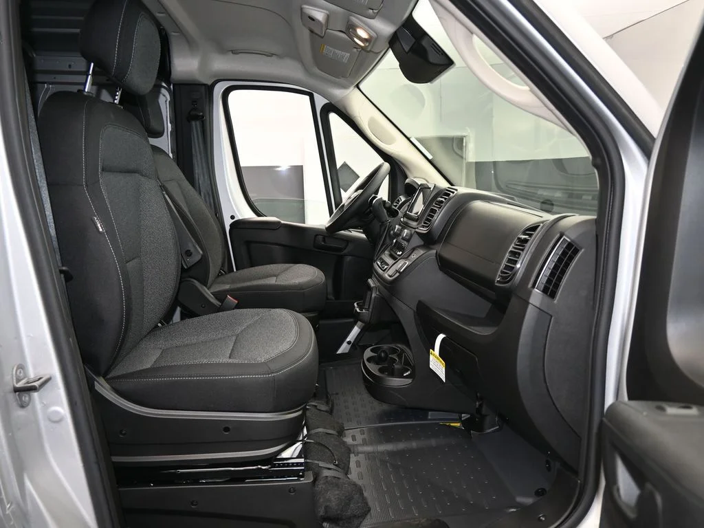 Used 2025 Bright Silver Clearcoat Metallic Ram Low Roof image 34