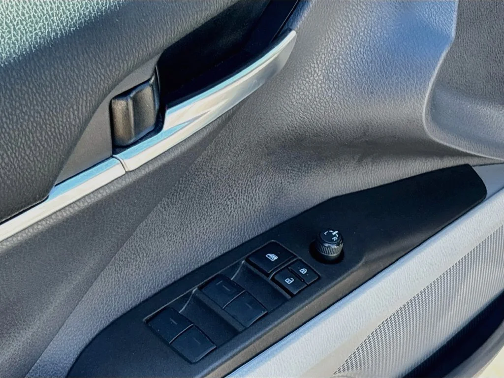 Used 2024 Celestial Silver Metallic Toyota LE image 18