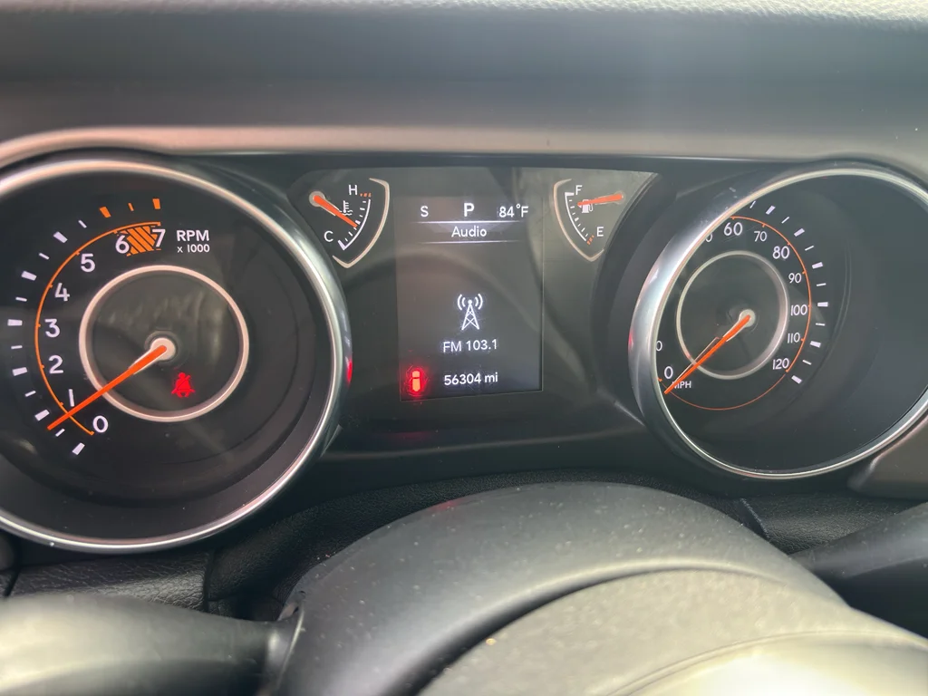 Used 2018 Granite Crystal Metallic Clearcoat Jeep Sport S image 11