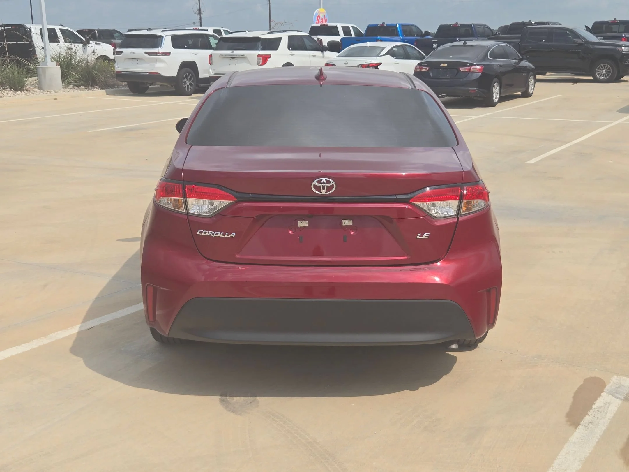 Used 2024 Red Toyota LE image 4
