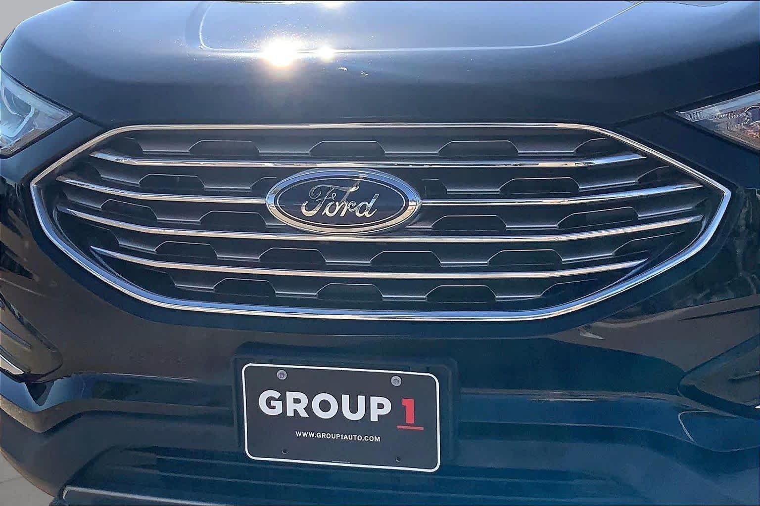 Certified Used 2022 Agate Black Metallic Ford SEL image 30