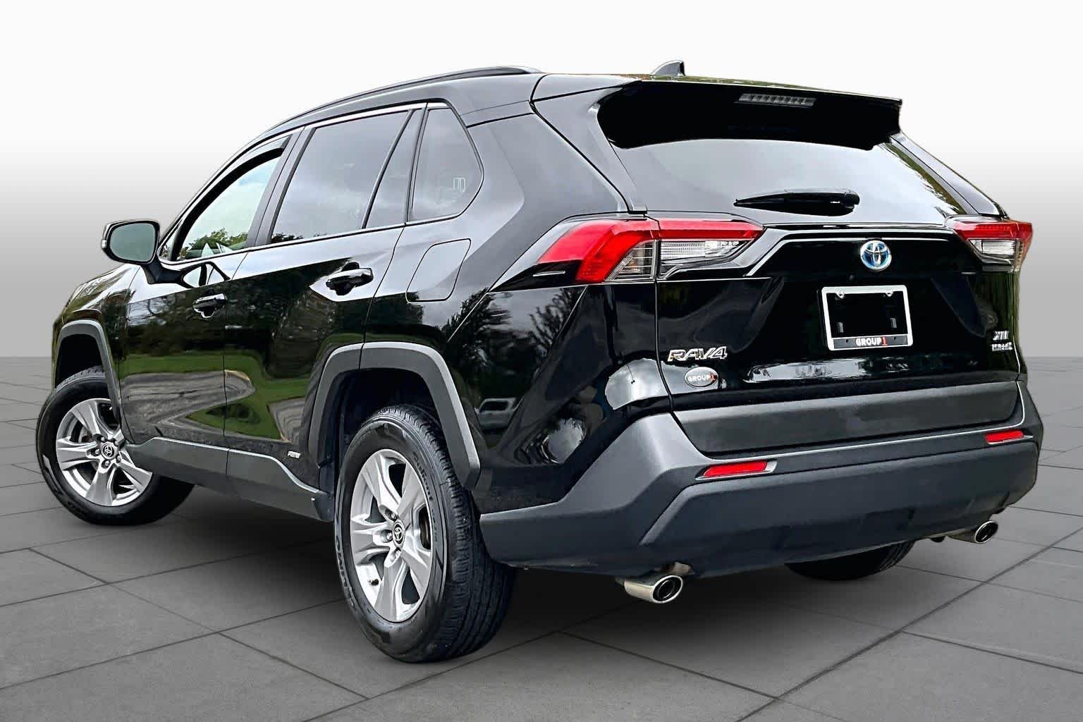 Used 2023 Midnight Black Metallic Toyota Hybrid XLE image 12