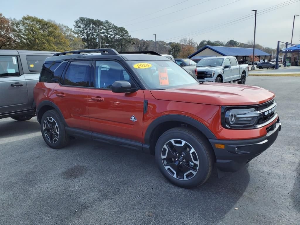 Used 2024 Hot Pepper Red Metallic Tinted Clearcoat Ford Outer Banks image 6