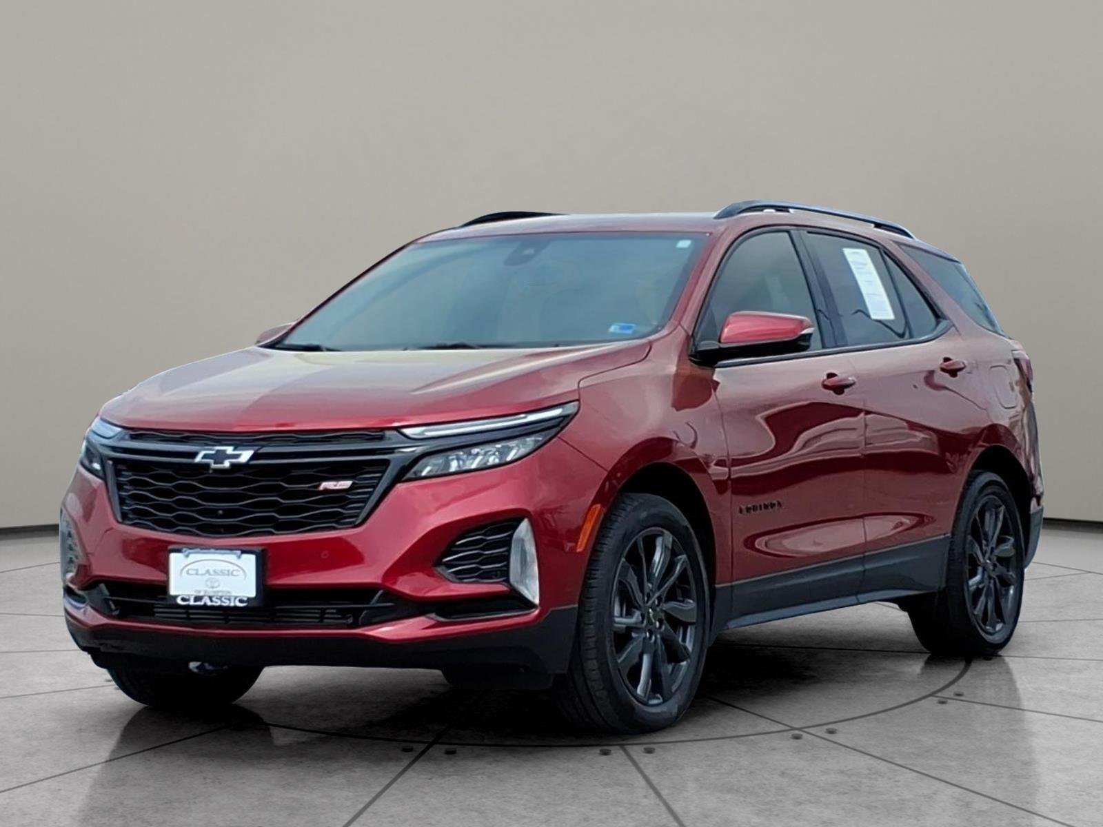Used 2024 Radiant Red Tintcoat Chevrolet RS image 1