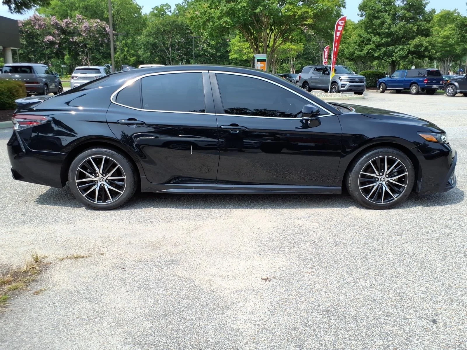 Used 2023 Midnight Black Metallic Toyota SE image 7
