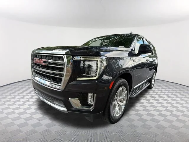 Used 2023 Titanium Rush Metallic GMC SLT image 1
