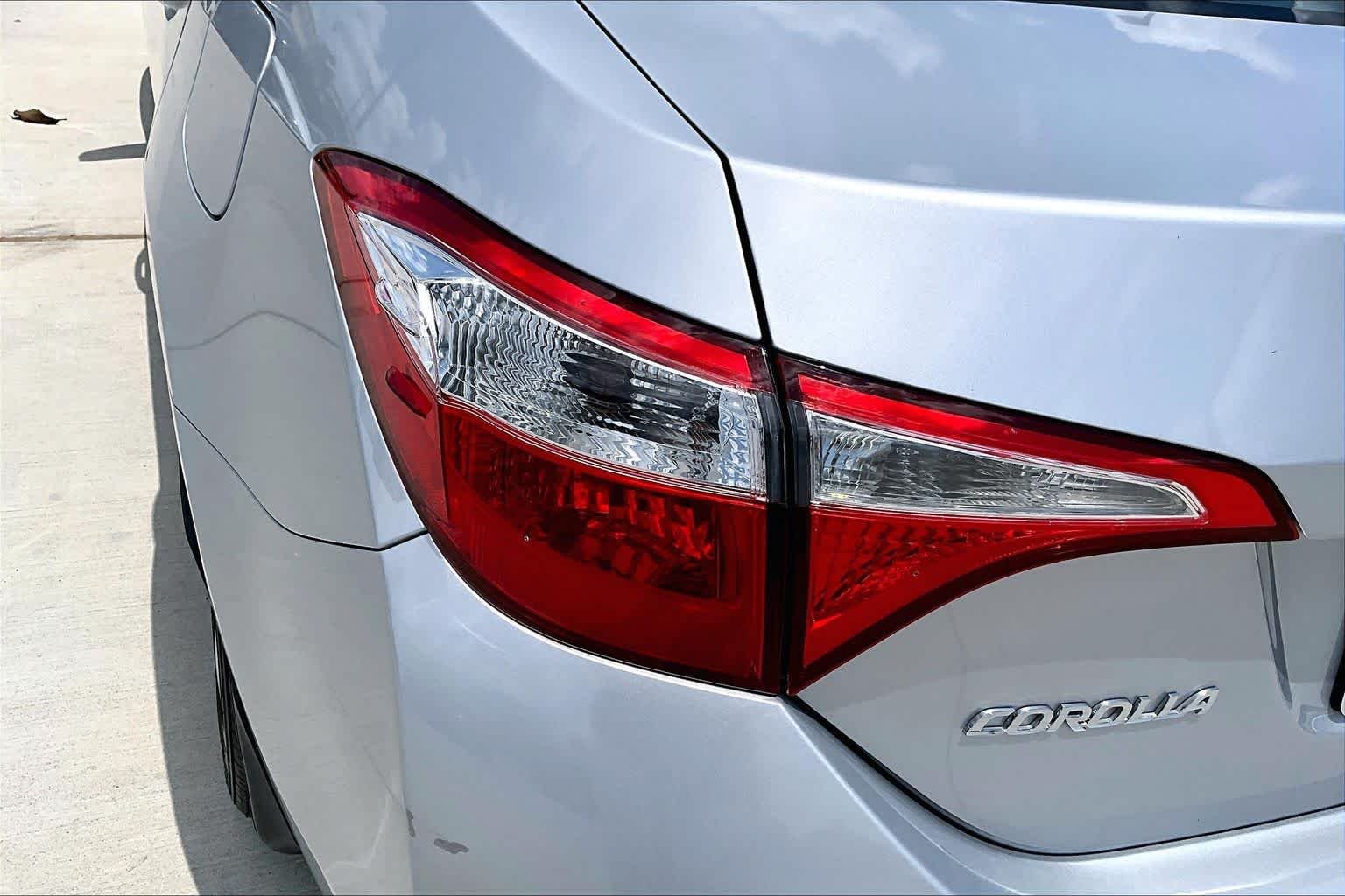 Used 2016 Classic Silver Metallic Toyota LE image 25