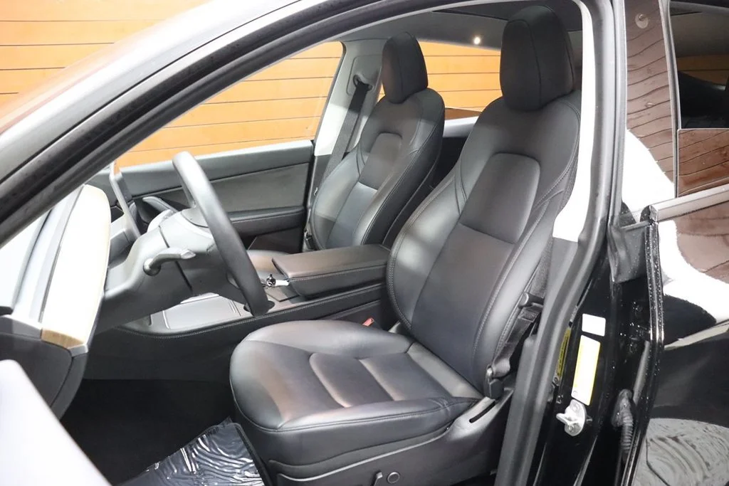 Used 2022 Solid Black Tesla Performance image 31