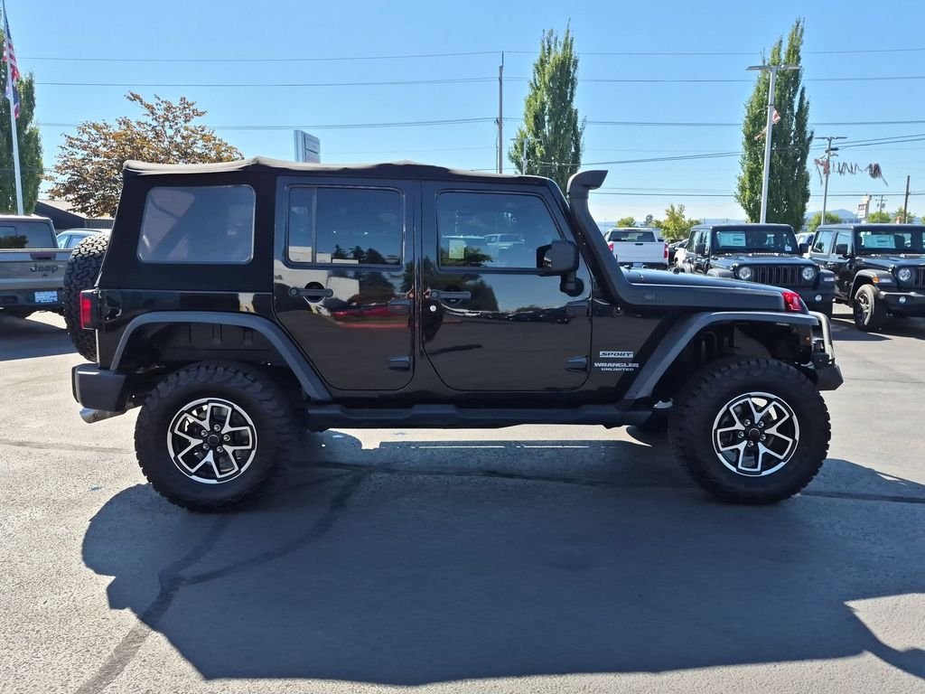 Used 2015 Black Clearcoat Jeep Unlimited Sport image 7