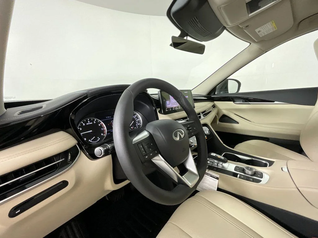 New 2025 White INFINITI Pure FWD image 8