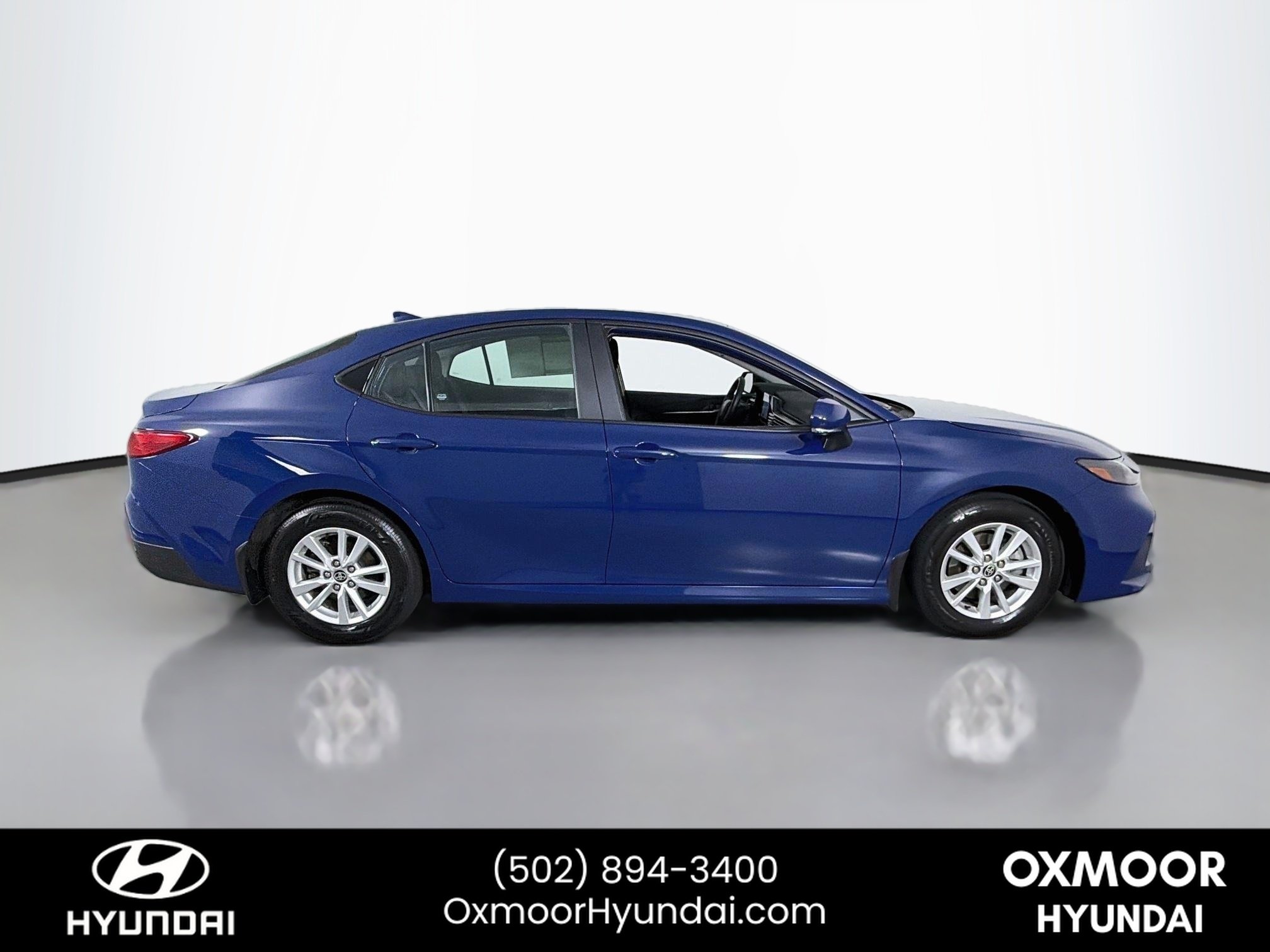 Used 2025 Reservoir Blue Toyota LE image 8