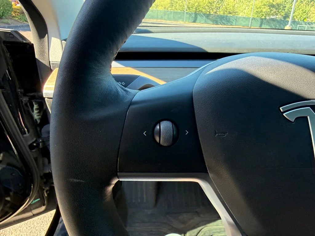 Used 2021 Solid Black Tesla Standard Range Plus image 11