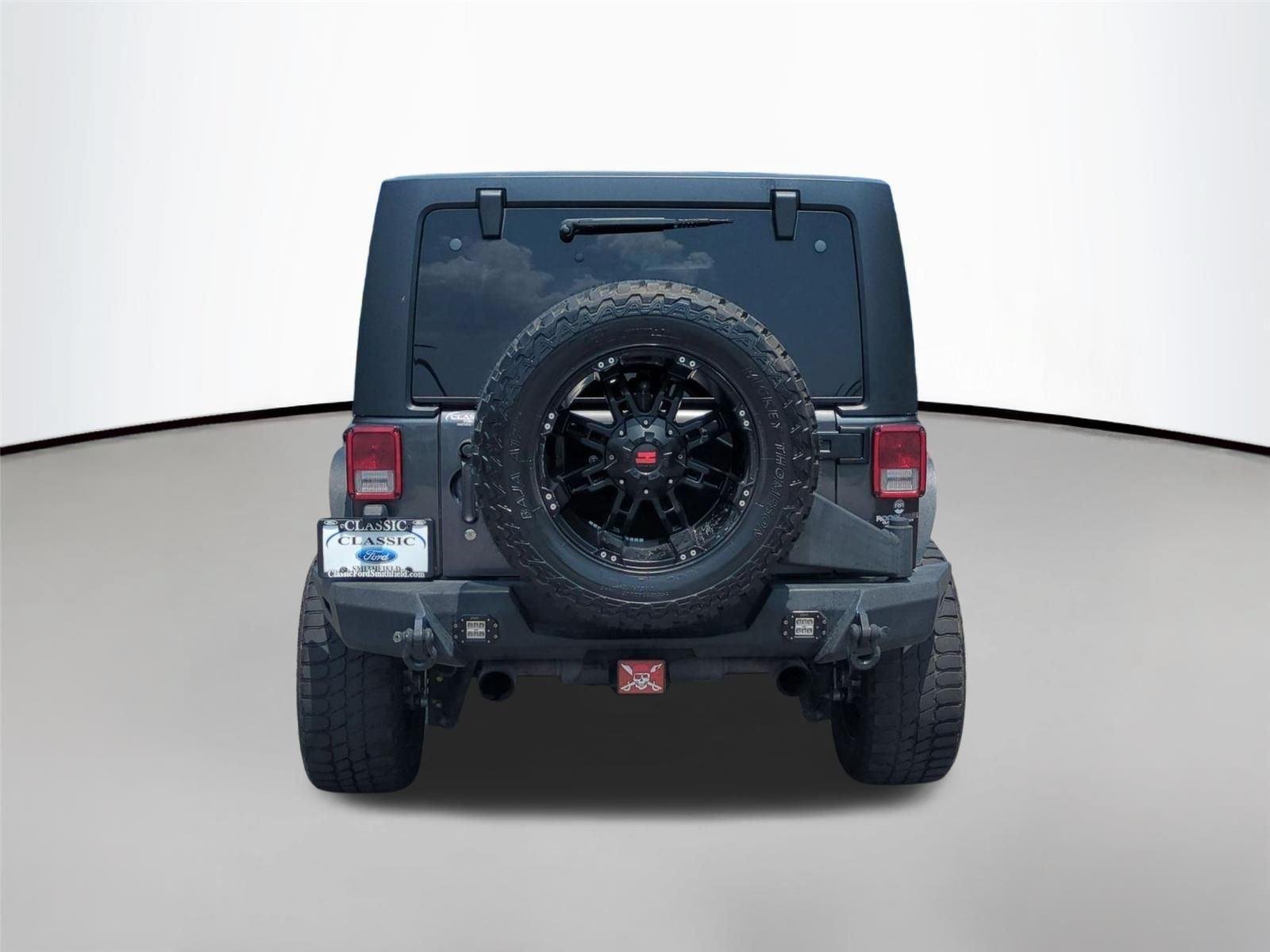 Used 2017 Granite Crystal Metallic Clearcoat Jeep Rubicon image 4