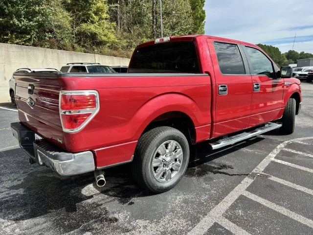 Used 2010 Red Candy Metallic Tinted Clearcoat Ford XLT image 6