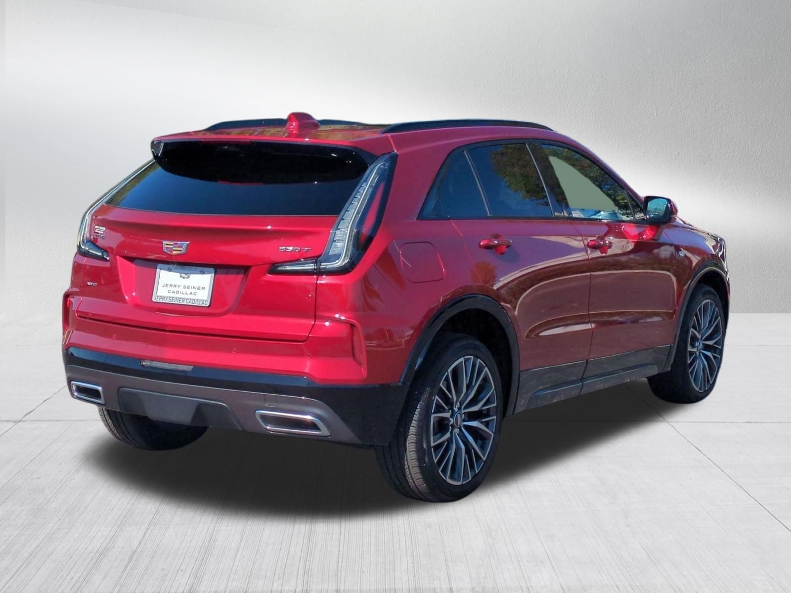 Used 2024 Radiant Red Tintcoat Cadillac Sport image 5