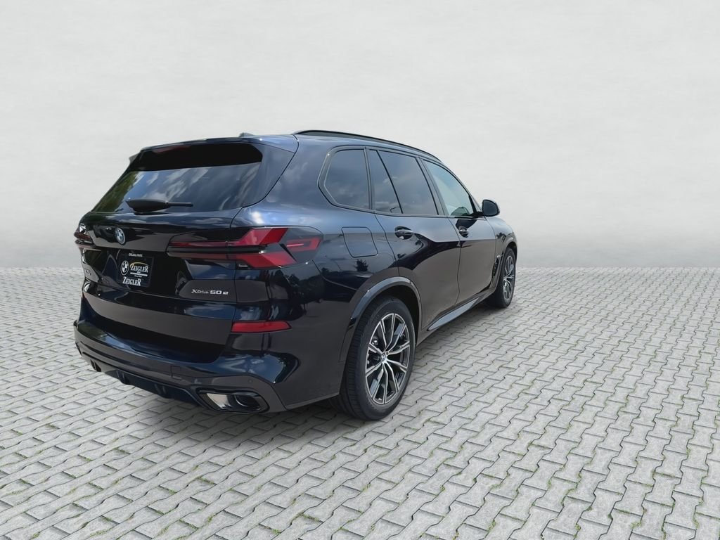 New 2026 Carbon Black Metallic BMW xDrive50e image 8
