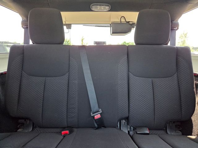 Used 2013 Red Jeep Unlimited Sport image 10