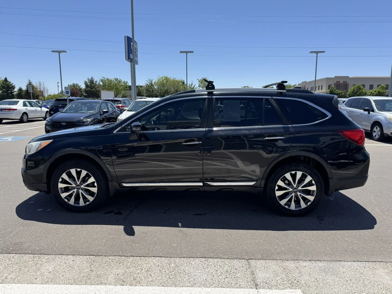Used 2017 Crystal Black Silica Subaru Touring image 4