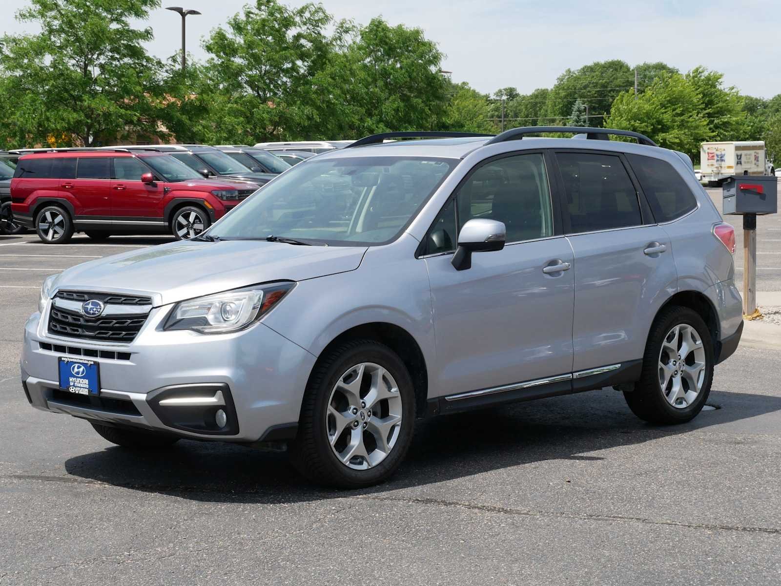 Used 2017 Subaru Forester Touring with VIN JF2SJAWC4HH575844 for sale in Mankato, Minnesota