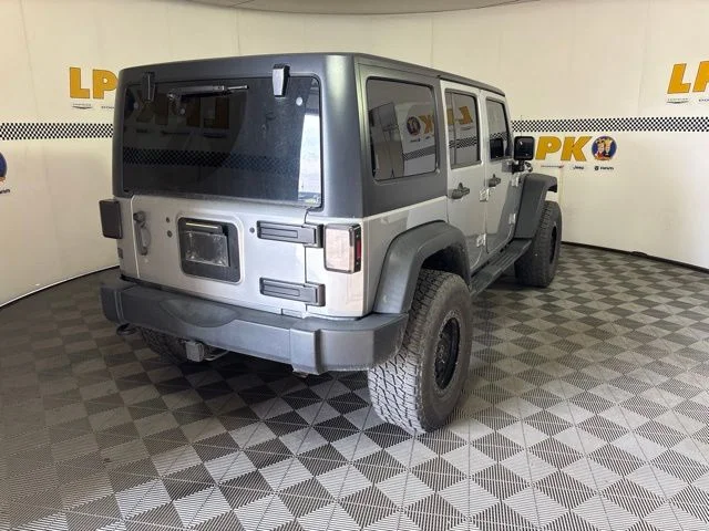 Used 2014 Billet Metallic Clearcoat Jeep Unlimited Sport image 3