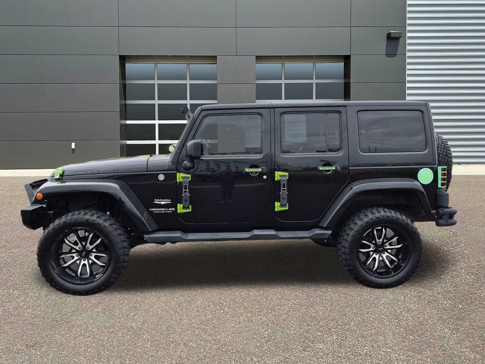 Used 2015 Black Clearcoat Jeep Sahara image 9